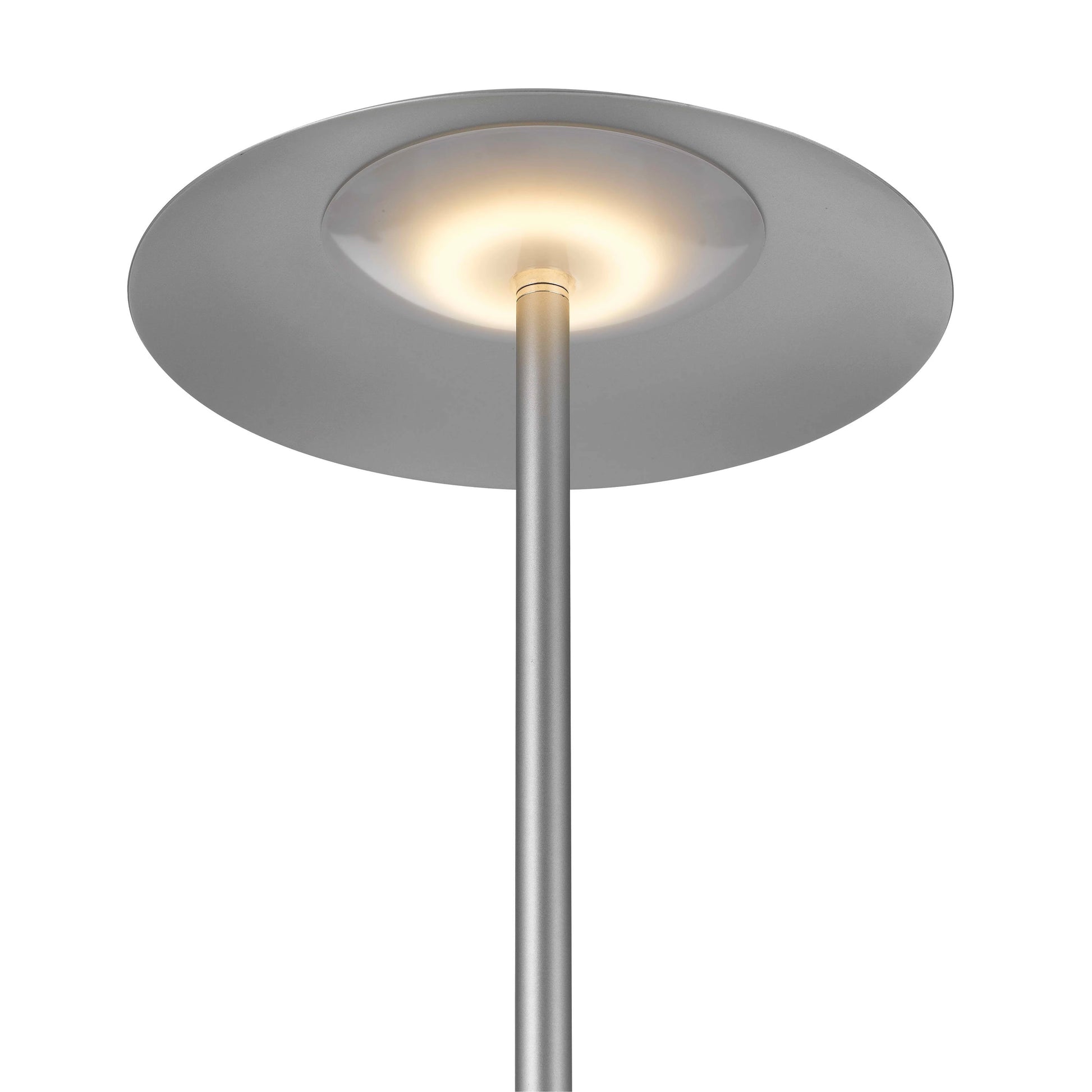 A modern floor lamp with a circular lampshade, featuring a built-in table top shelf and wireless charging pad, providing both lighting and functionality.