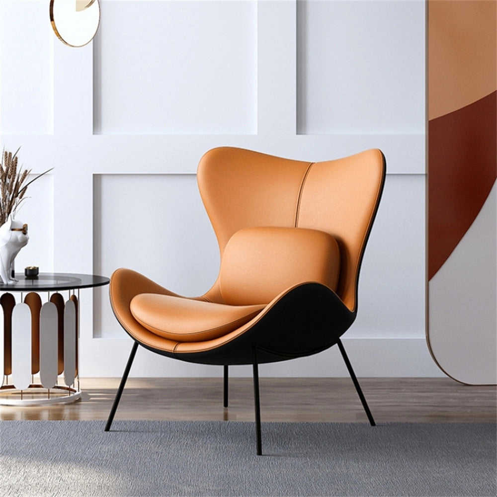 Modern geometric accent chair with wooden legs, placed in a stylish living room next to a potted plant on a wooden floor.