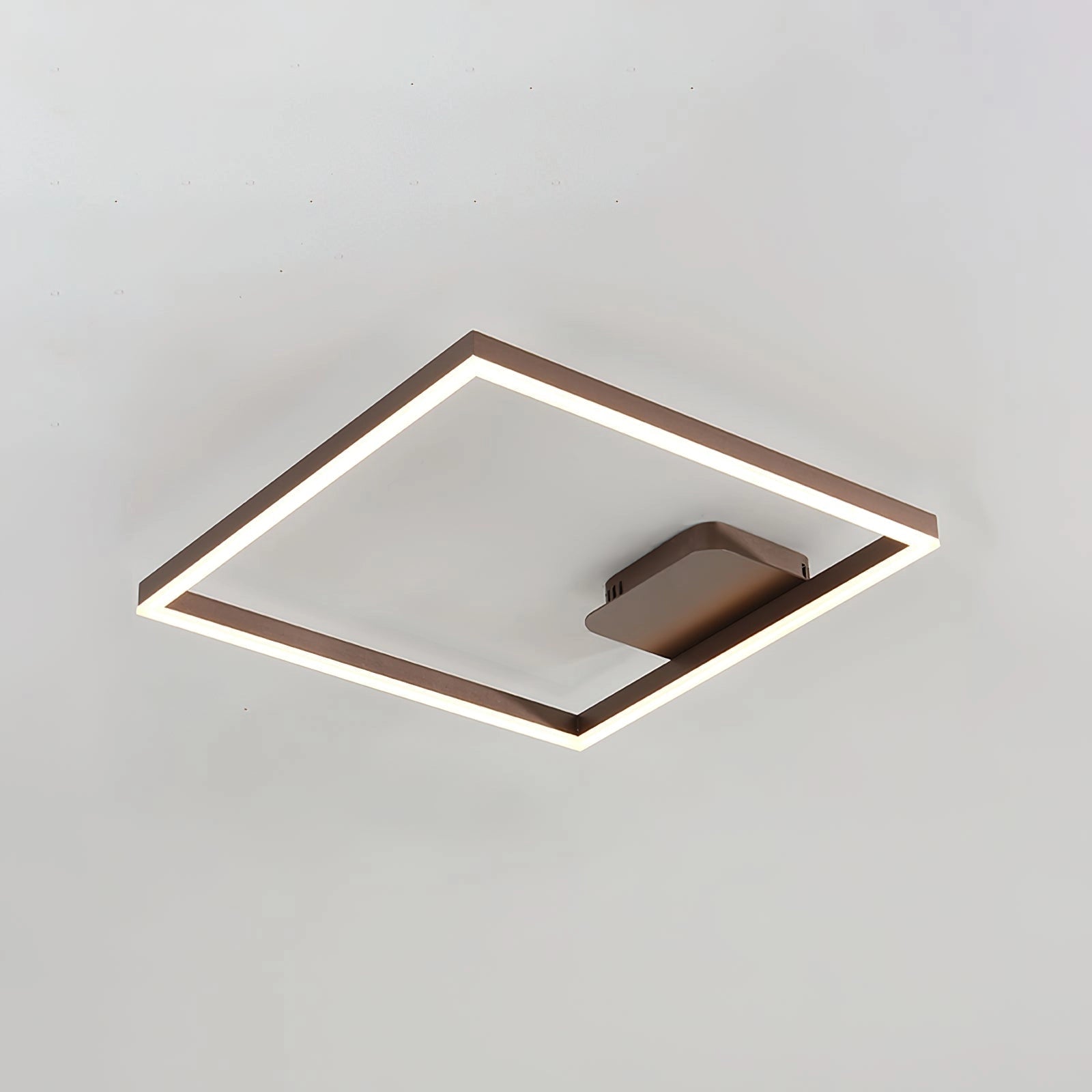Modern Geometric Aluminum Pendant Light in Brown with LED Technology, featuring an artistic design and cool light, hanging from the ceiling.