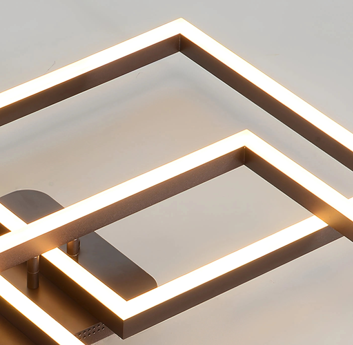 Modern geometric aluminum pendant light with LED technology, featuring a rectangular design with brown wood-stained accents and symmetrical triangular patterns.