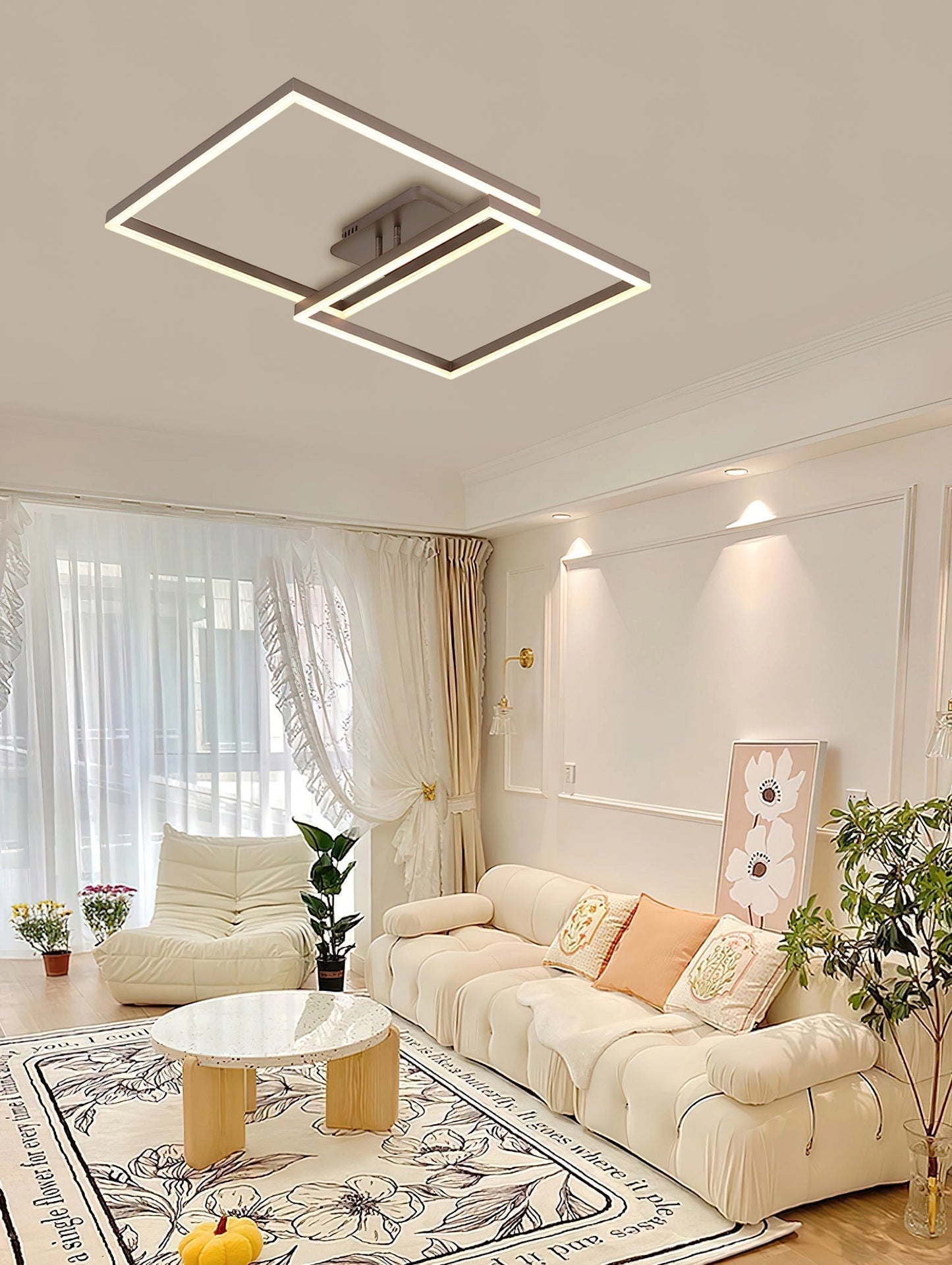Modern geometric aluminum pendant light with LED technology hanging in a stylish living room with wooden flooring and yellow accents, accompanied by a potted plant for decoration.