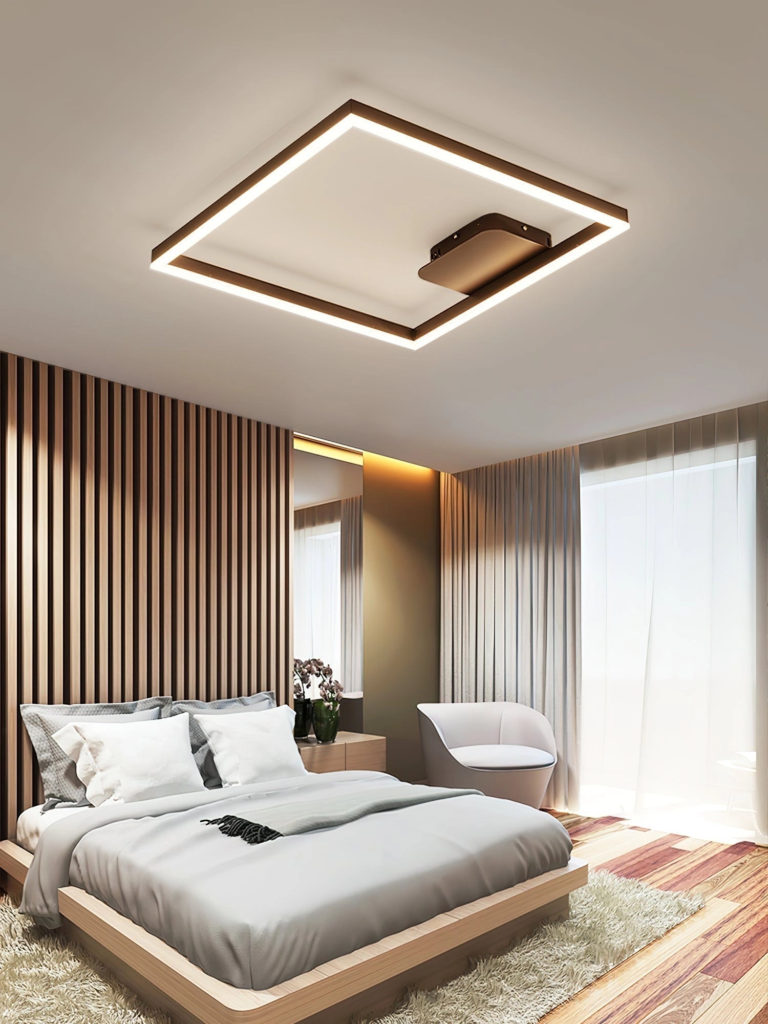 Modern artistic geometric aluminum pendant light with LED technology hanging in a stylishly designed interior with wood accents.