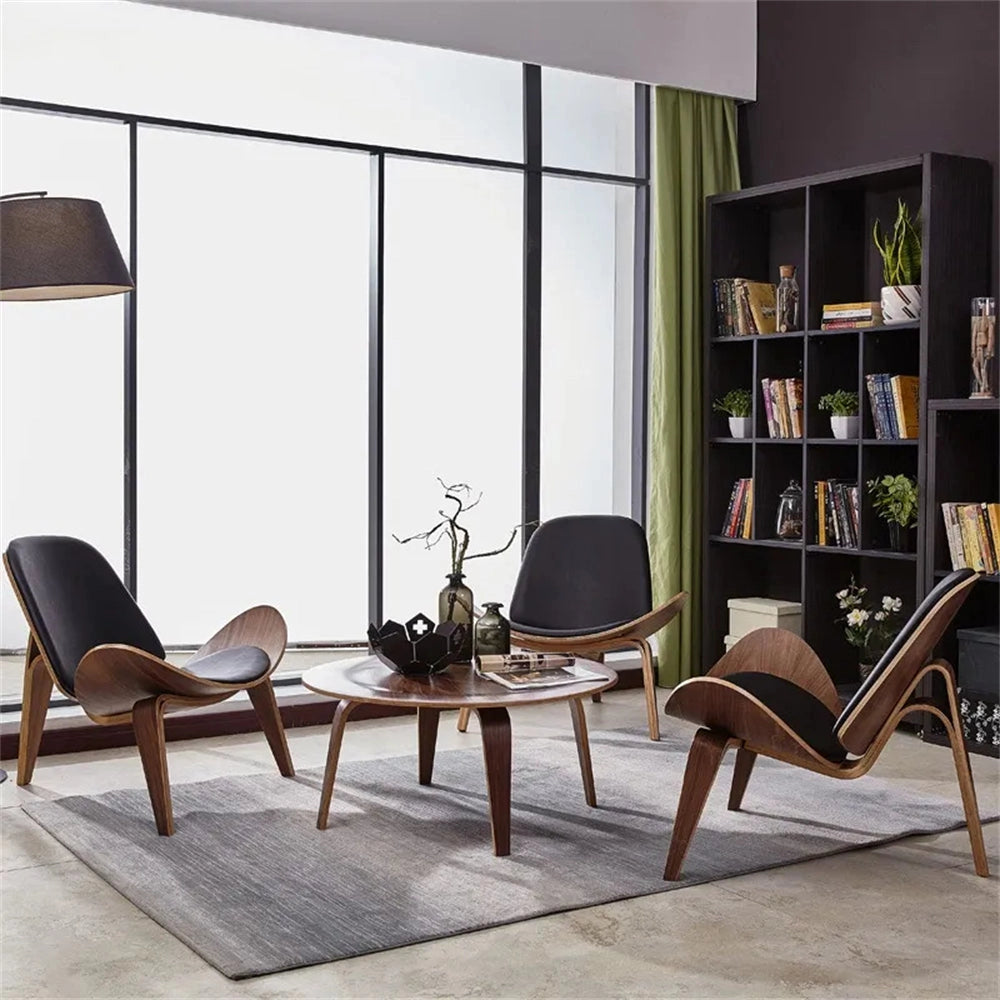 Geometric retro accent chair in a modern living space with wooden legs, large windows, and indoor plants.