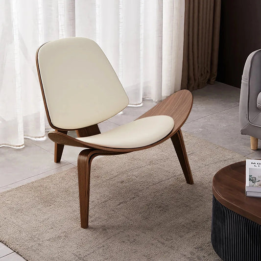 Geometric Retro Accent Chair with wooden legs in a modern living space featuring hardwood flooring.