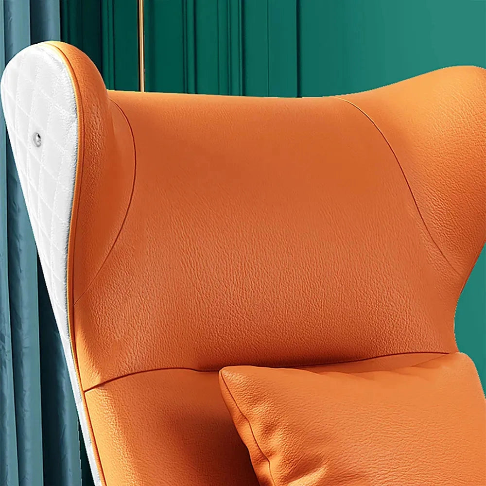 Geometric Wingback Accent Chair with Gold Trestle Base featuring armrests and a comfortable seat, paired with a throw pillow.
