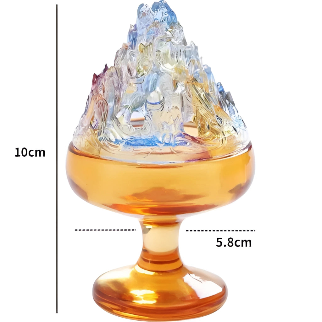 Glass incense burner with amber-colored liquid interior, perfect for zen home decor.