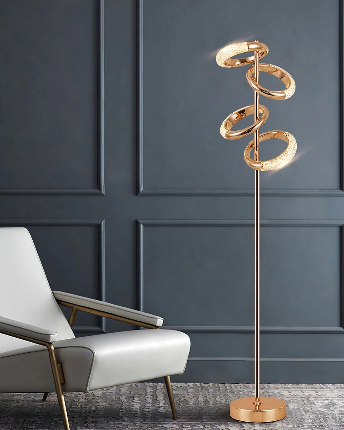 Gold Diamond-Patterned Adjustable Angles Floor Lamp with a rectangular base, wooden elements, metal arm, and glass lampshade, positioned on a hardwood floor against a light-colored wall.