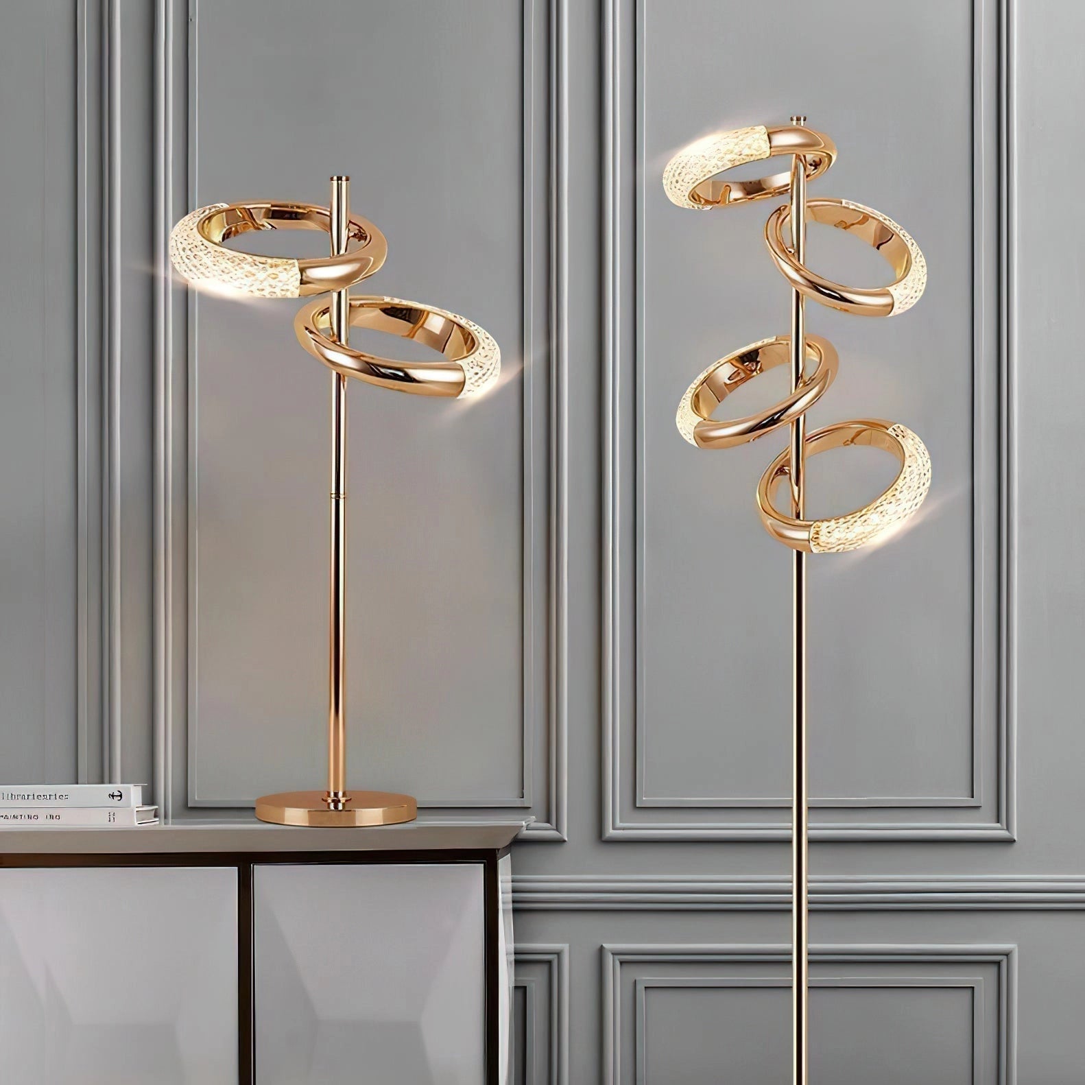 Gold diamond-patterned floor lamp with adjustable angles, featuring a rectangular wooden base and amber lighting.
