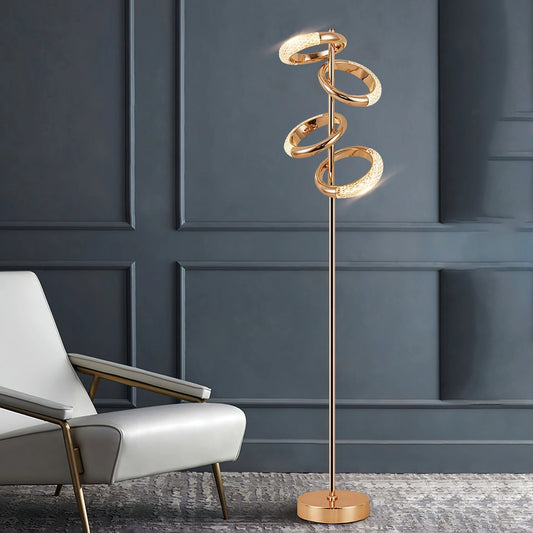 Gold Diamond-Patterned Adjustable Angles Floor Lamp illuminating a modern interior with wooden flooring and contemporary furniture.