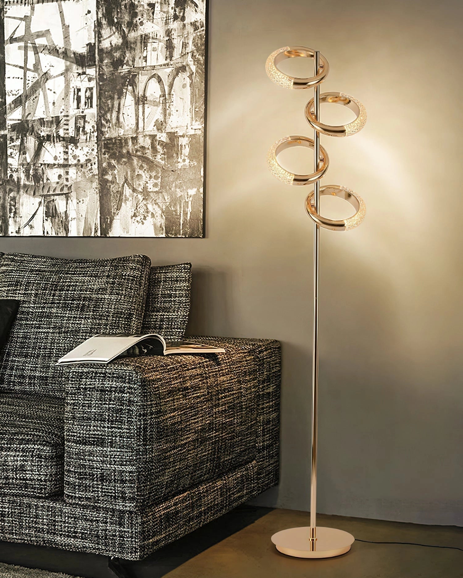 Gold diamond-patterned adjustable angles floor lamp in a stylish interior setting with wooden elements, wall art, and modern furniture including a chair and table.