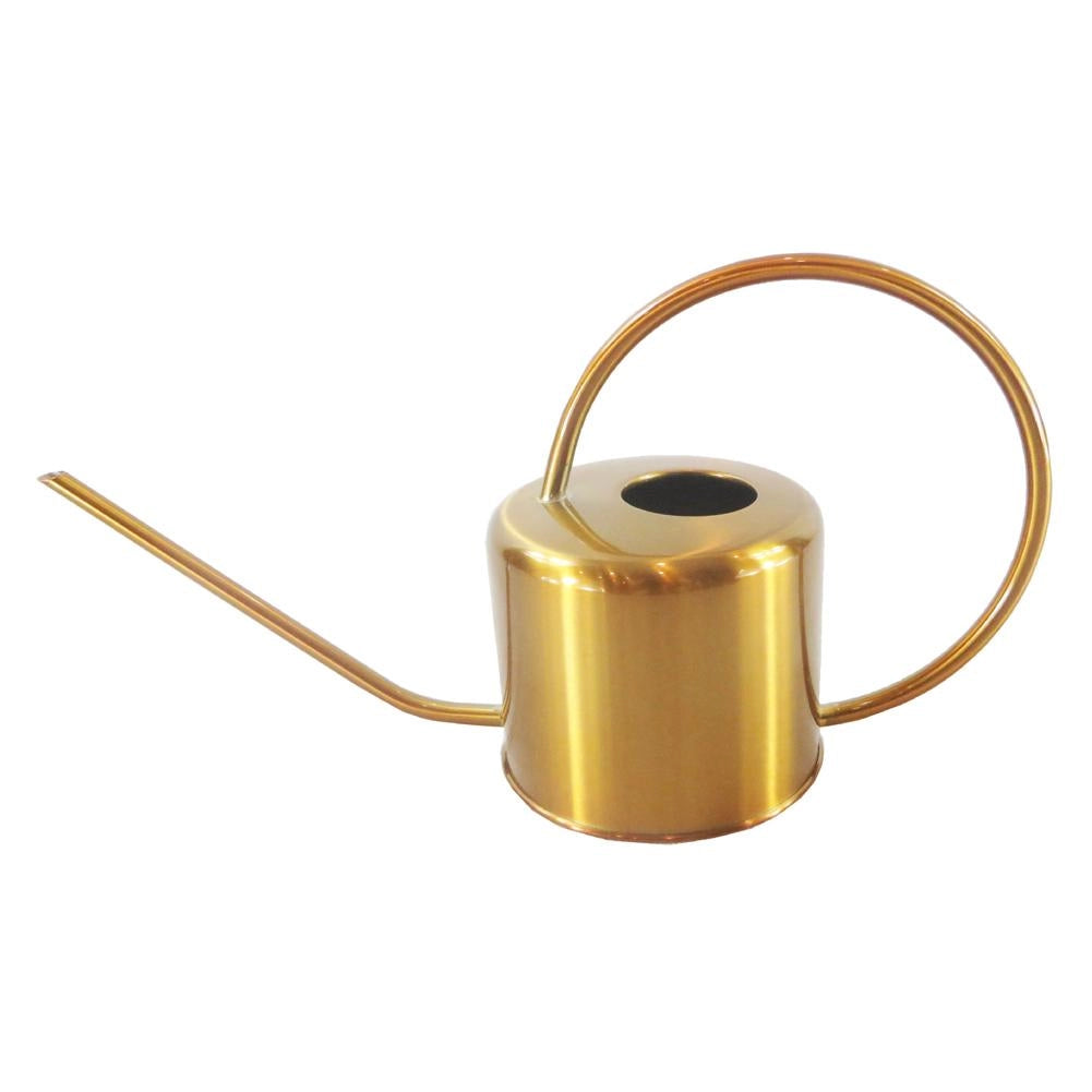 Gold stainless steel watering can with a sleek design, placed on a table, ideal for plant care and indoor gardening.
