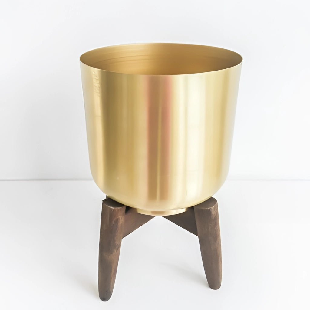 Golden Iron Plant Stand with Wooden Base, featuring a cylindrical metal frame and wooden platform, suitable for displaying plants or decorative items.