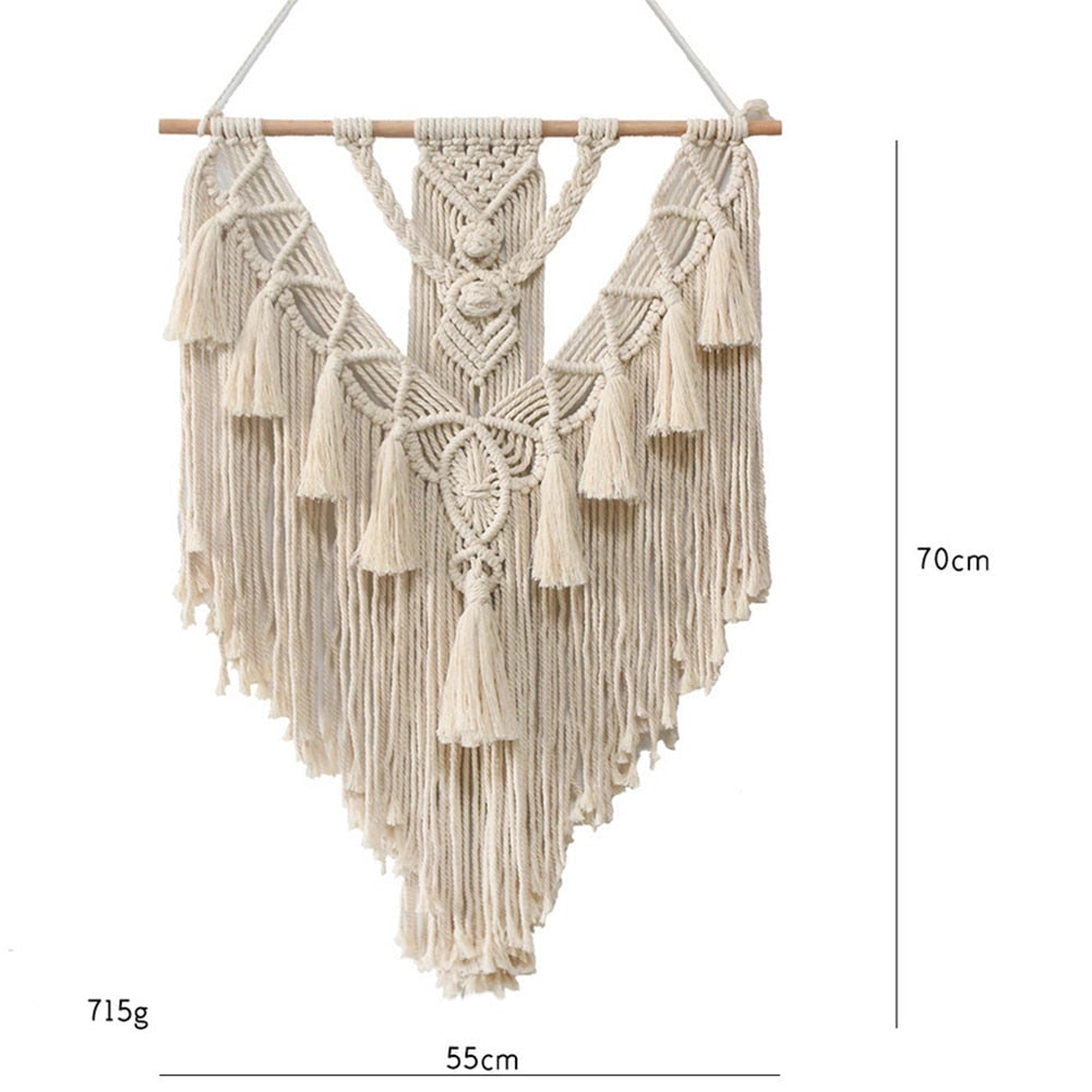 Handwoven macrame boho wall hanging tapestry featuring geometric art decor with symmetrical patterns and wooden accents displayed against a neutral background.