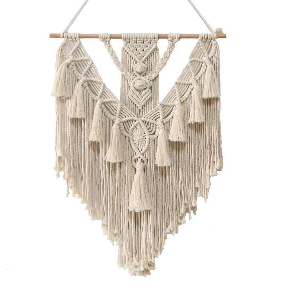 Handwoven macrame boho wall hanging tapestry featuring geometric art design, displayed on a wooden clothes hanger.