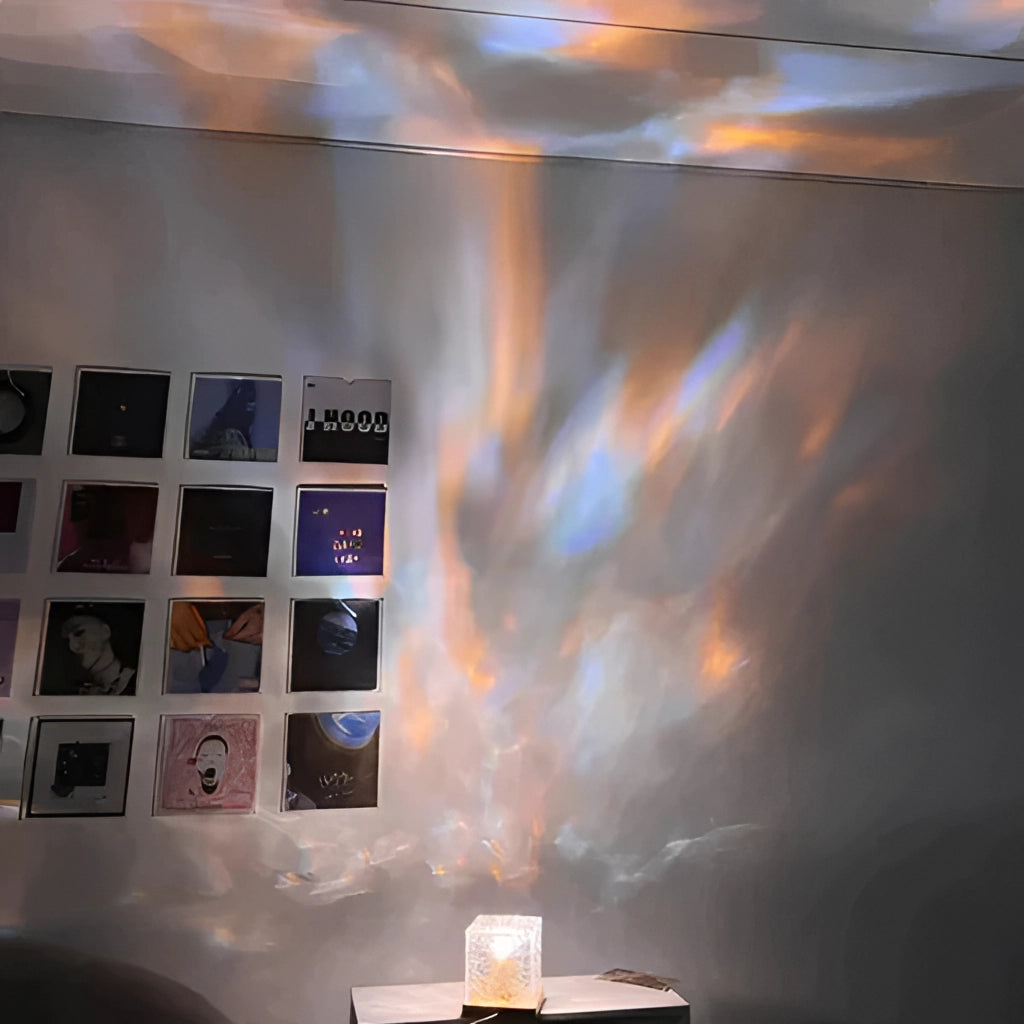 A stylish, modern Interior Lamp CubeLight placed on a nightstand, illuminating the space with a soft glow.