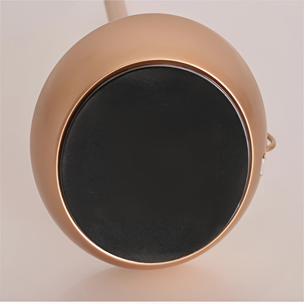 Iron lamp with unique candle design and 3-level dimming option on a wooden surface.