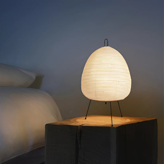 Japanese Rice Paper Table Lamp with wooden base and rectangular shade, placed on a table, blending traditional design with modern aesthetics.