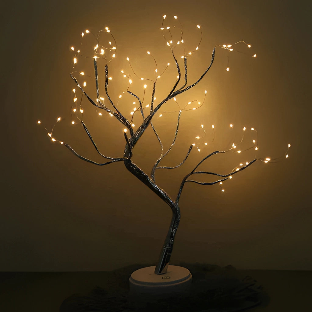 LED Fairy Tree Light with 108 Mini LEDs illuminated in a dark space, featuring twig-like branches.