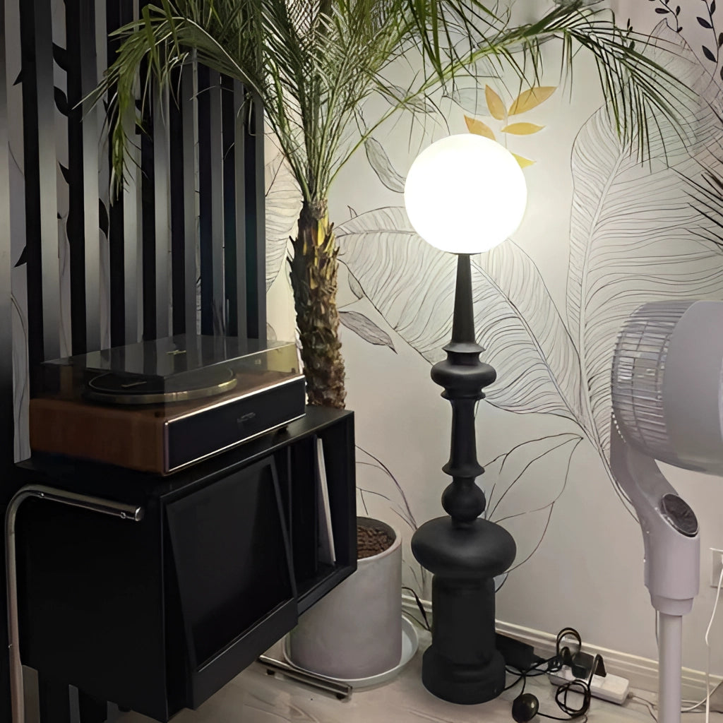 Modern LED floor lamp with two usage modes, placed in a stylishly designed interior, featuring wooden flooring, a potted plant, and clean architectural lines.