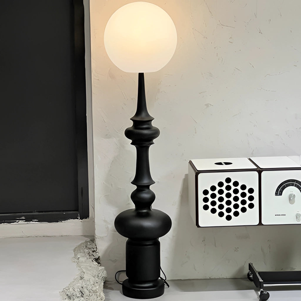 LED Floor Lamp with Two Usage Modes placed in a modern living room setting featuring a wall, art, wooden elements, and an alarm clock in the background.