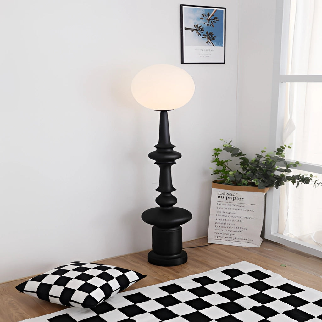 LED floor lamp with two usage modes placed in a modern interior setting, featuring a wooden table, potted plant, and light-colored flooring.