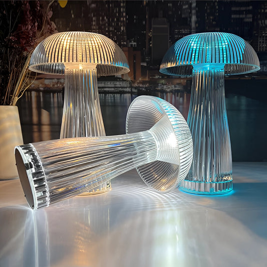LED table lamp with steepless dimming and large battery, featuring a modern design and sleek glass elements, illuminated in a dark space.