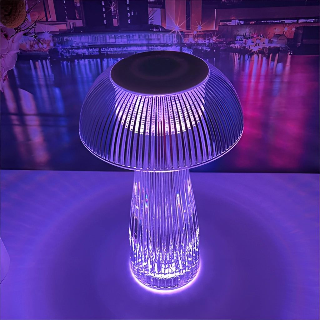 LED Table Lamp with Steepless Dimming and Large Battery, Purple Light, on a Table with a Skyscraper in the Background.
