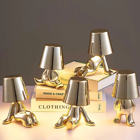 A sleek and modern LED table lamp with a unique cylindrical design, made of high-quality metal, showcased in a stylish room setting.