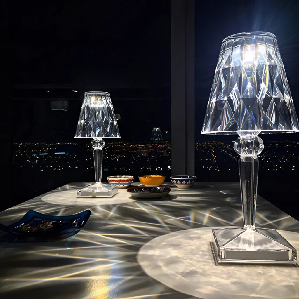 LED Touch Table Lamp with USB Charging on a table alongside various glass drinkware and tableware items.