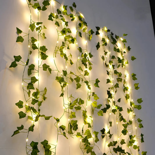 LED vine garden string lights with ivy vines, 32ft with 100 LEDs, featuring realistic greenery and illuminated leaves.