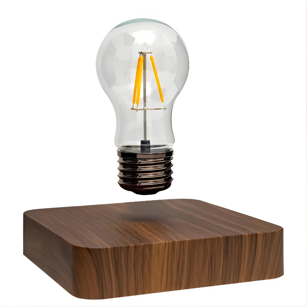 Levitating LED desk lamp with walnut base, featuring a sleek rectangular design and visible cable.