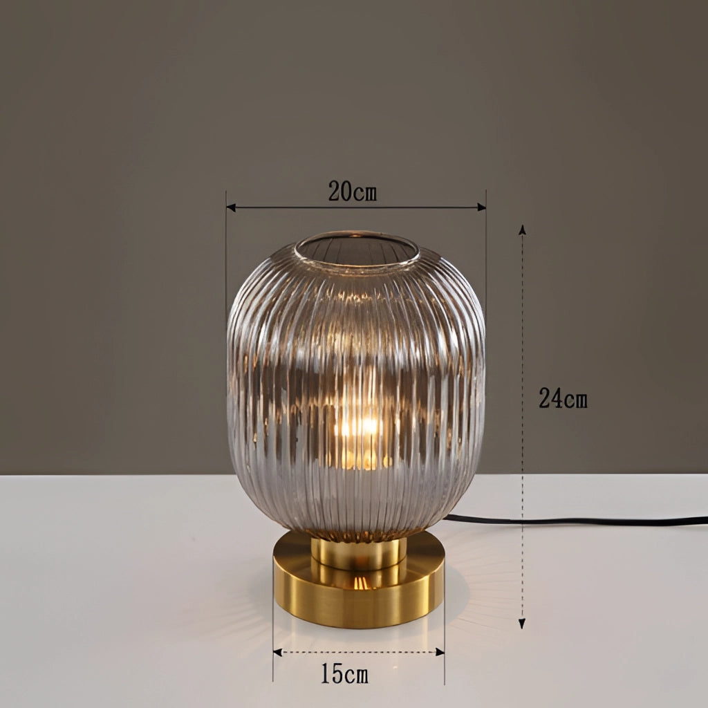 Luminescent Crystal Table Lamp in smoky gray, 20cm, featuring a sleek rectangular glass and metal design with a soft amber glow.