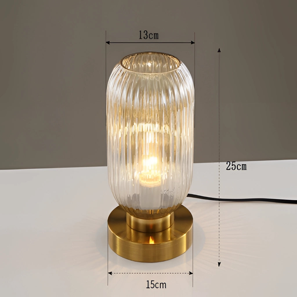 Luminescent Crystal Table Lamp Bernstein 13cm featuring a glass body with intricate metal accents and a glowing light fixture, designed as an artful lighting accessory.