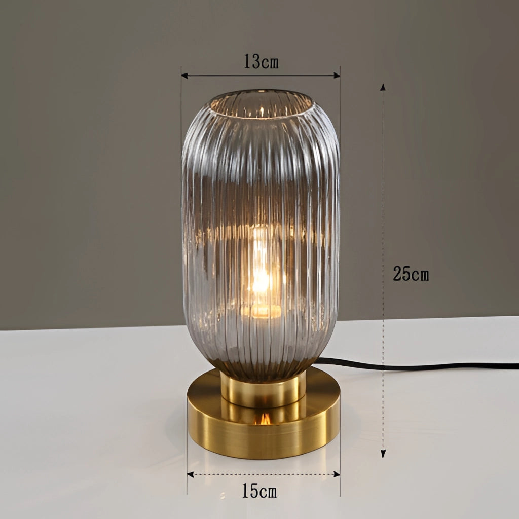 Luminescent Crystal Table Lamp in smoky gray, 13cm, featuring a transparent glass body with a metal base.