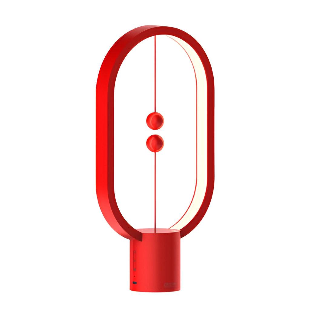 Red Magnetic Balance Table Lamp with LED Lighting, featuring a modern design with circular elements and bright LED illumination.