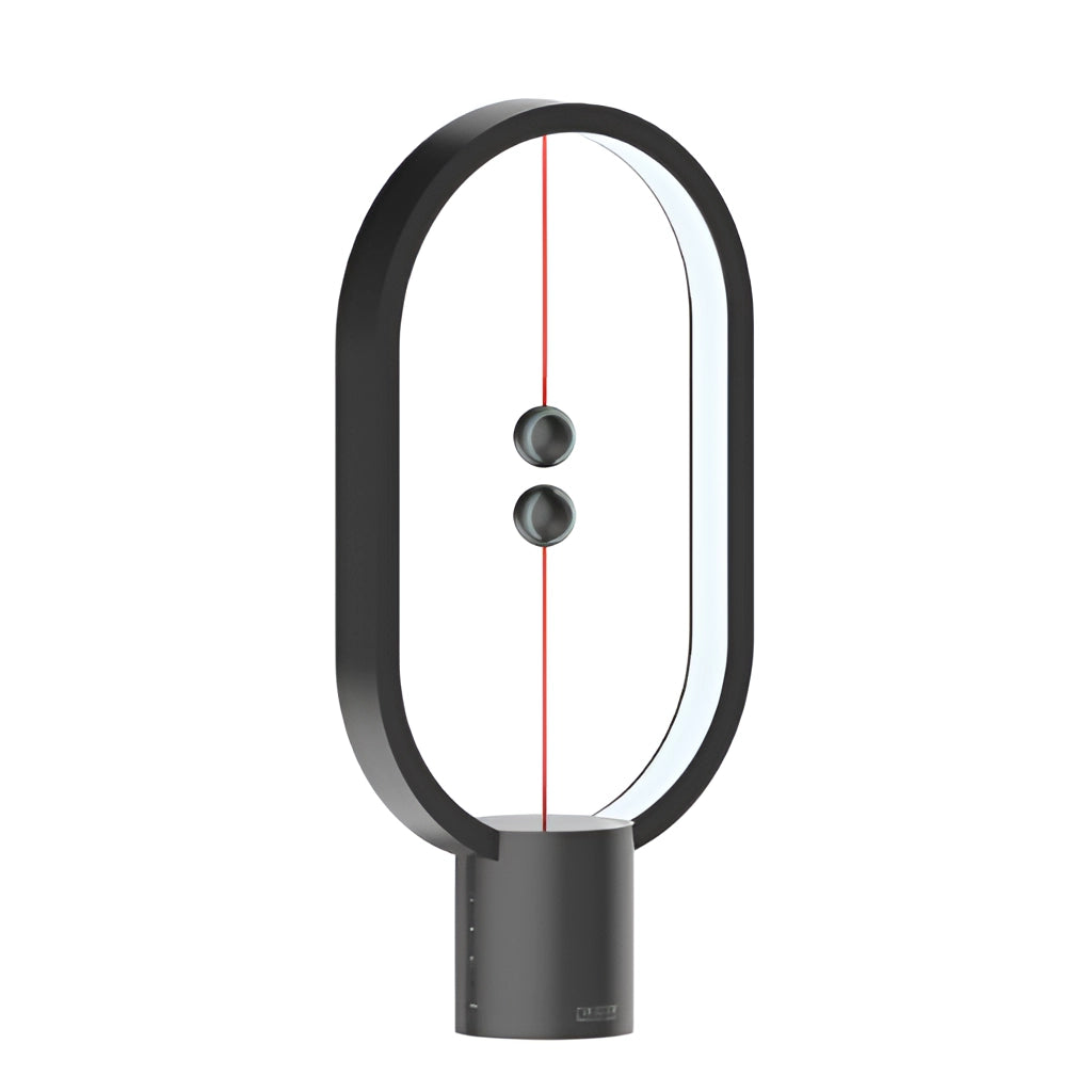 Black Magnetic Balance Table Lamp with LED lighting on a white background.