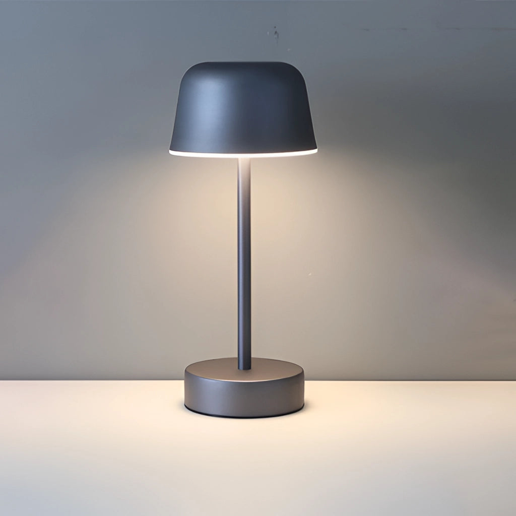 Dark gray metal table lamp with adjustable brightness and circular lampshade.