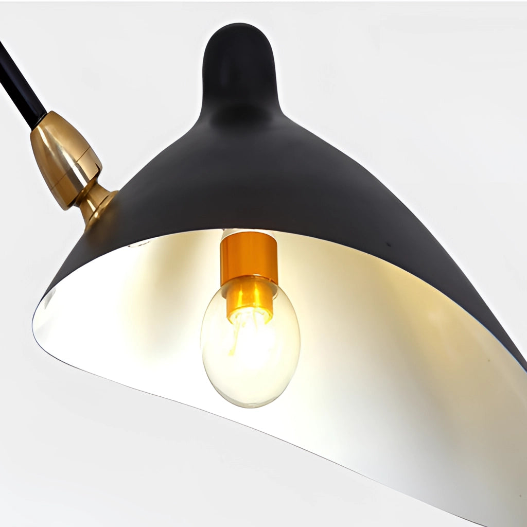 Midcentury floor lamp with tilting heads featuring a wooden base and amber-colored lighting, suitable for bedroom use.
