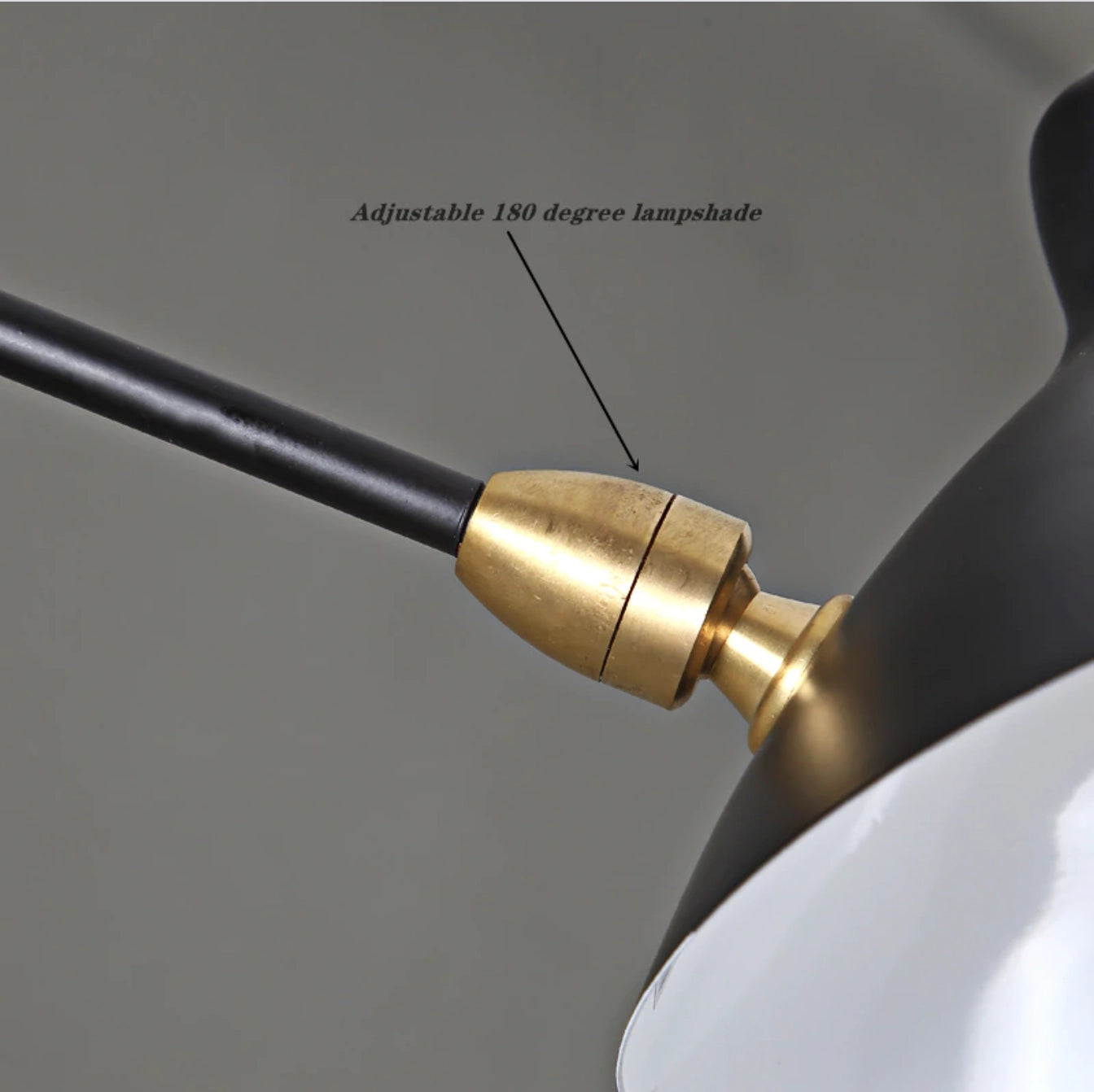 Midcentury floor lamp with tilting heads featuring a sleek metal design.
