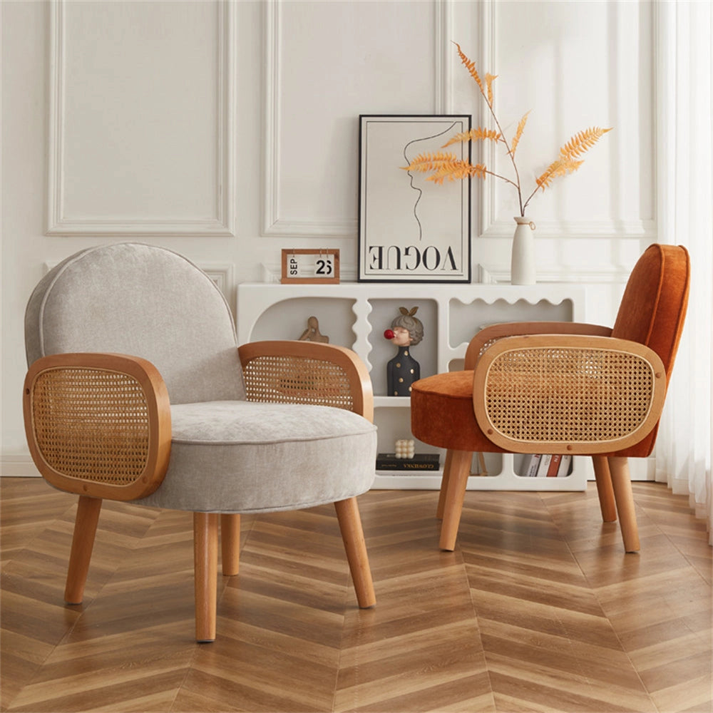 Modern grey club chair with wooden legs and armrests, designed for comfort and style, suitable for dining rooms or bedrooms.