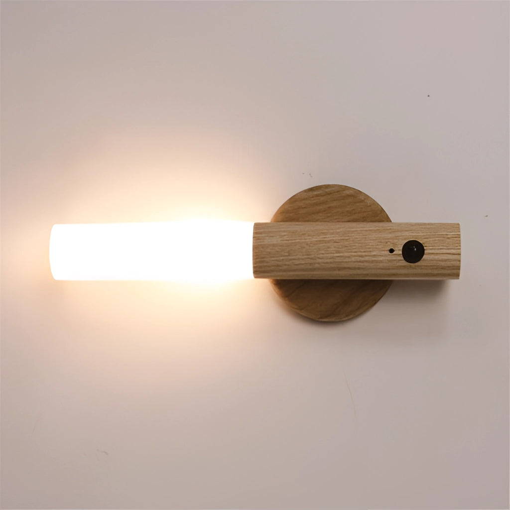 Motion Sensor LED Rechargeable Night Light with Wooden Design featuring a circular wooden outer casing and modern metal accents.