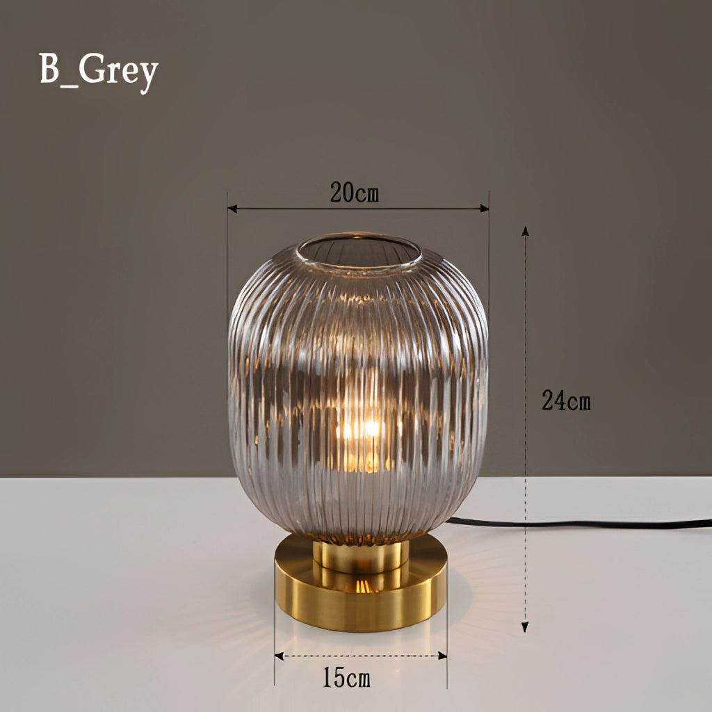 Nordic Amber Table Lamp with Stained Glass Shade in Gray, featuring an amber-hued glass shade, metal base, and modern aesthetic.