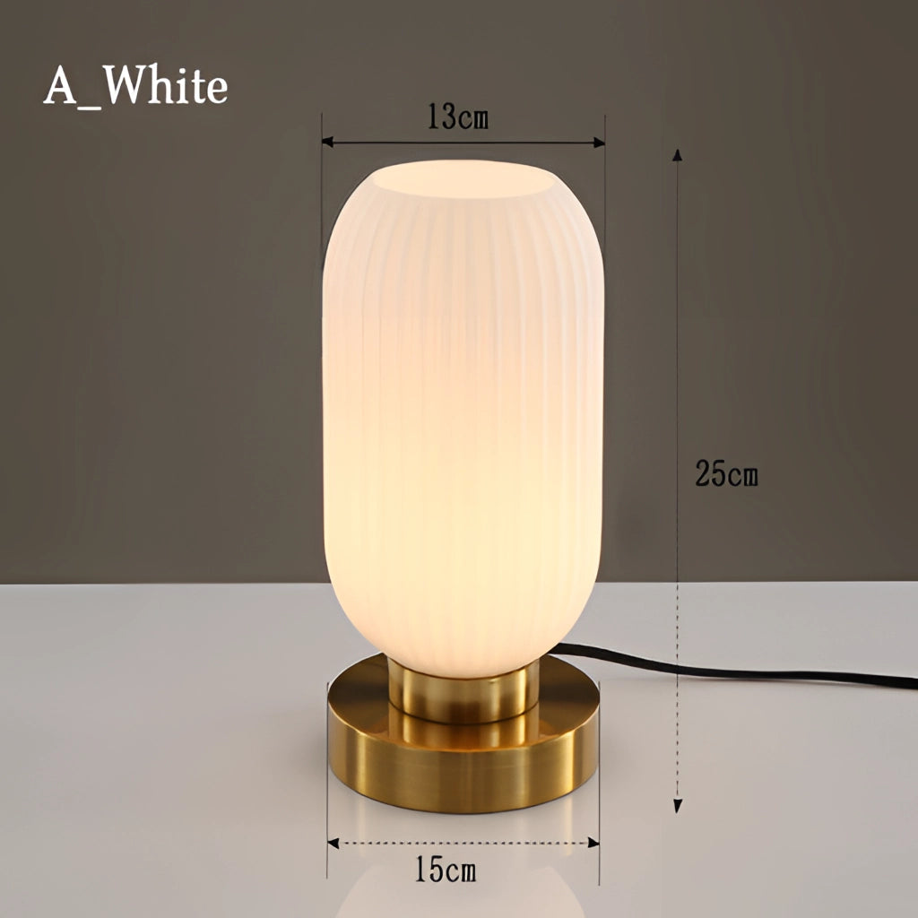 A white Nordic Amber table lamp with a stained glass shade featuring a rectangular base and cylindrical light fixture.