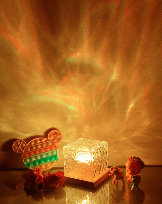 Northern Lights Inspired Cube Lamp with vibrant amber and orange hues resembling a colorful sky and clouds.