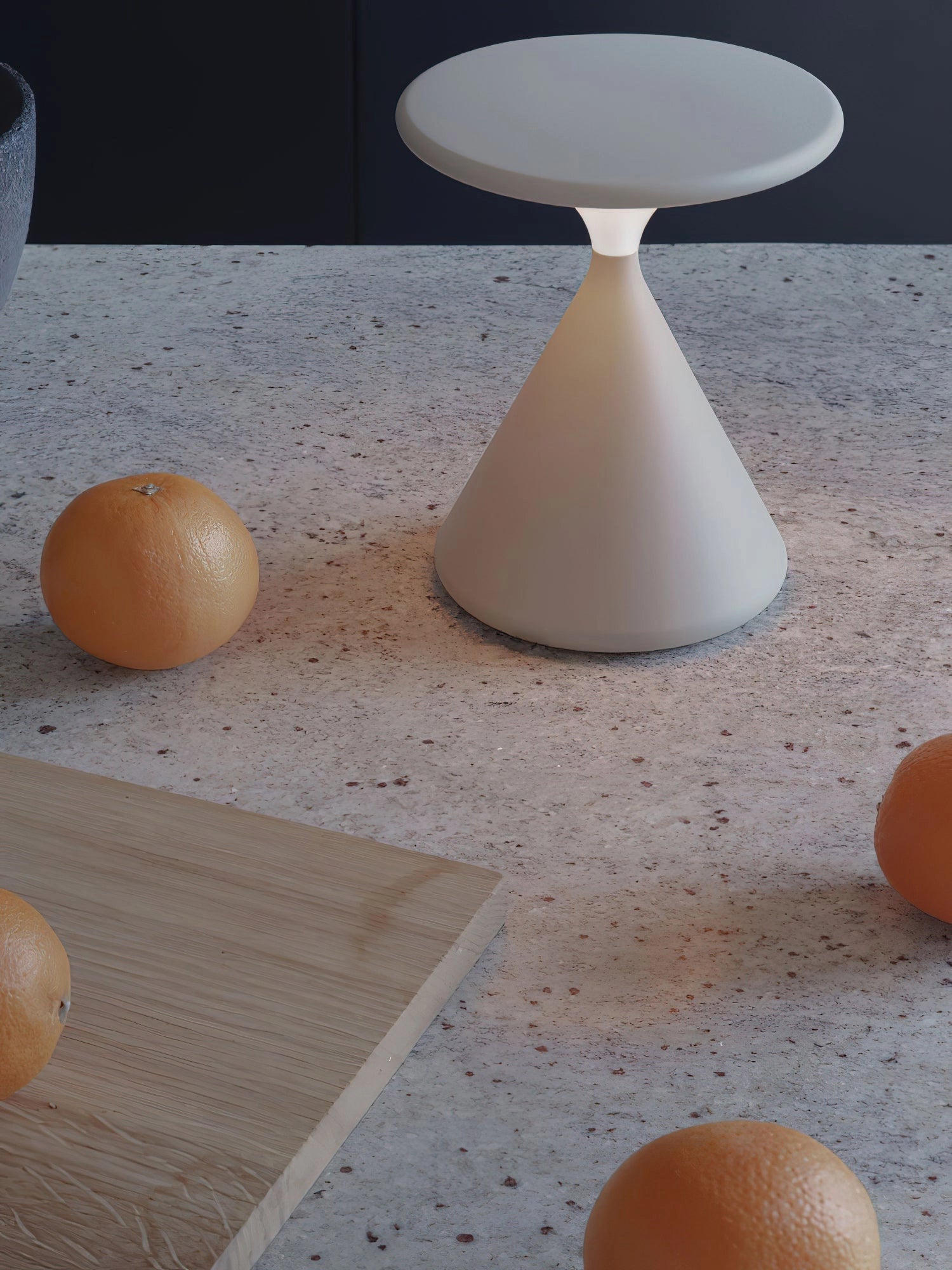 Outdoor cordless lamp for portable ambiance in an elegant design, placed on a wooden table with beige flooring in the background.