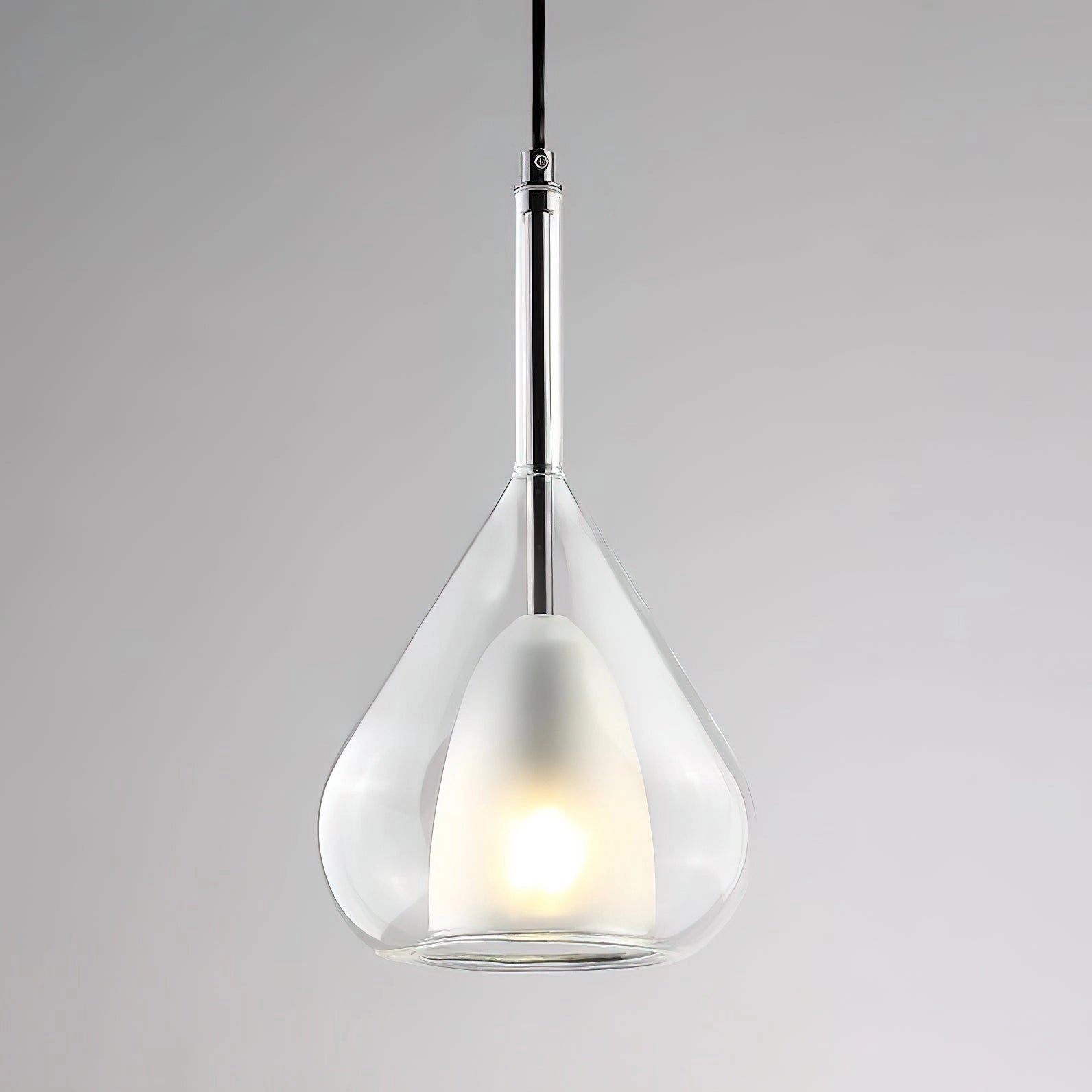 Nordic style pendant lamp with clear raindrop design and starlight effect, suspended from ceiling.