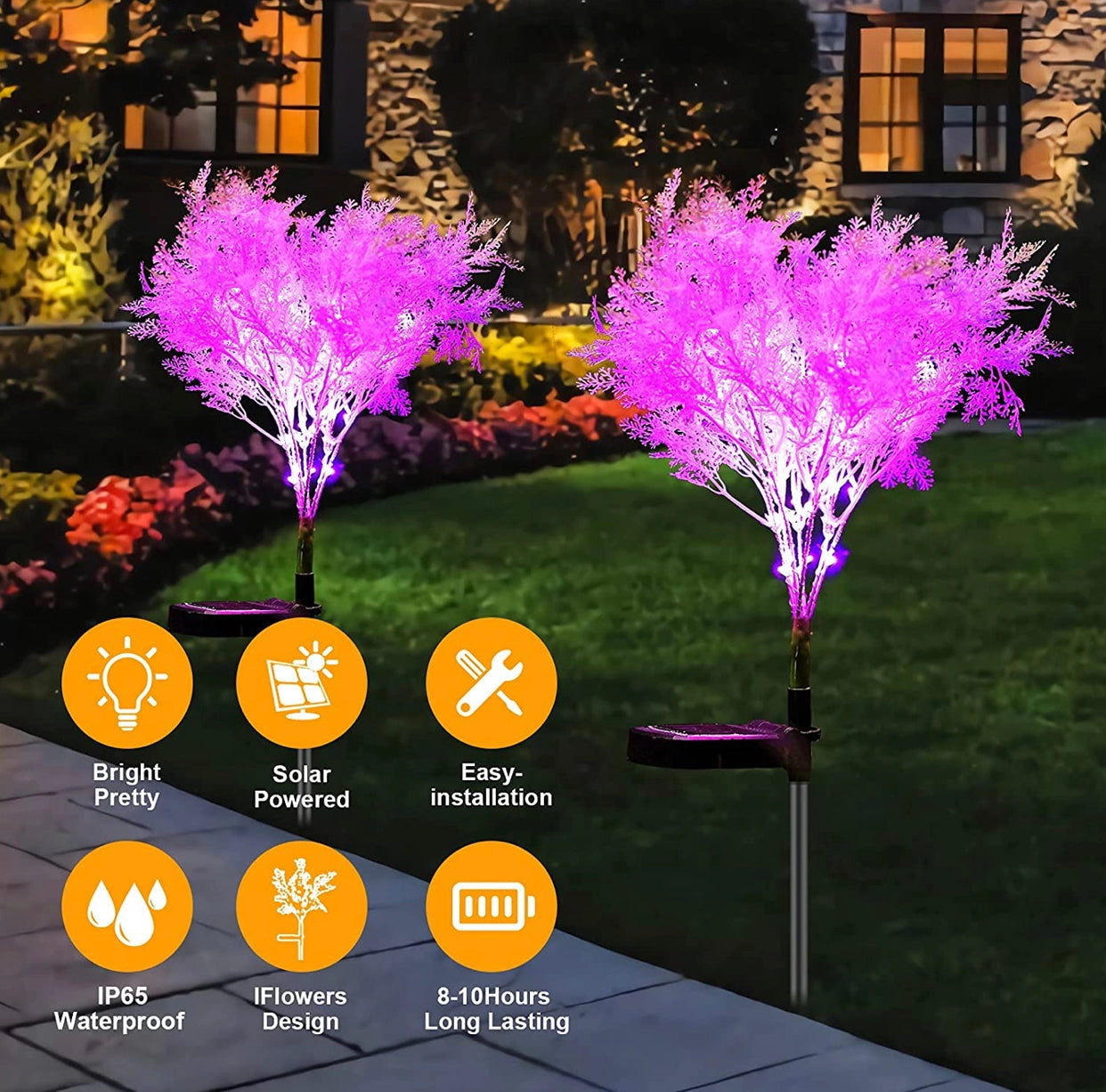Pink Solar Flowers Dusk to Dawn Lights in a garden setting, featuring vibrant pink and purple petals with green leaves, illuminated during dusk.