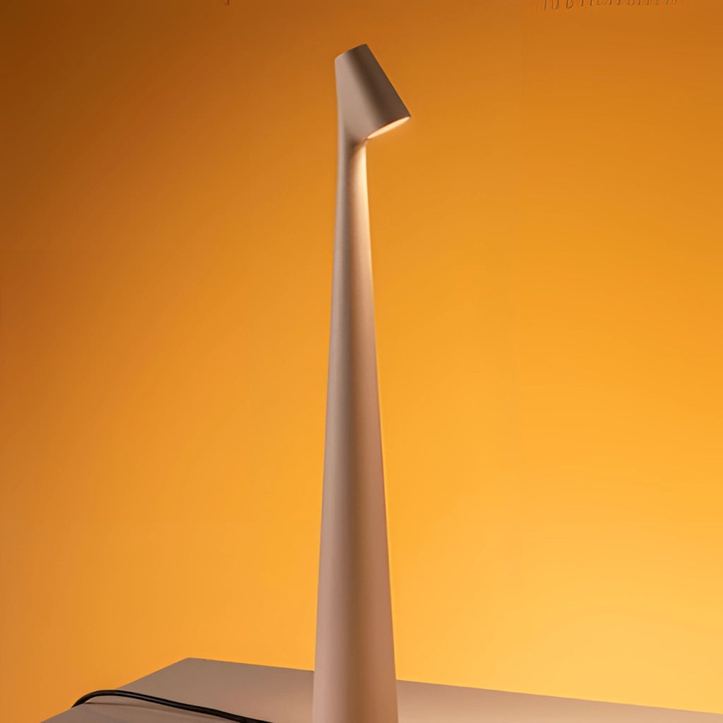 Portable rechargeable LED table lamp made of aluminum with three light intensities, featuring a sleek design and modern aesthetics.