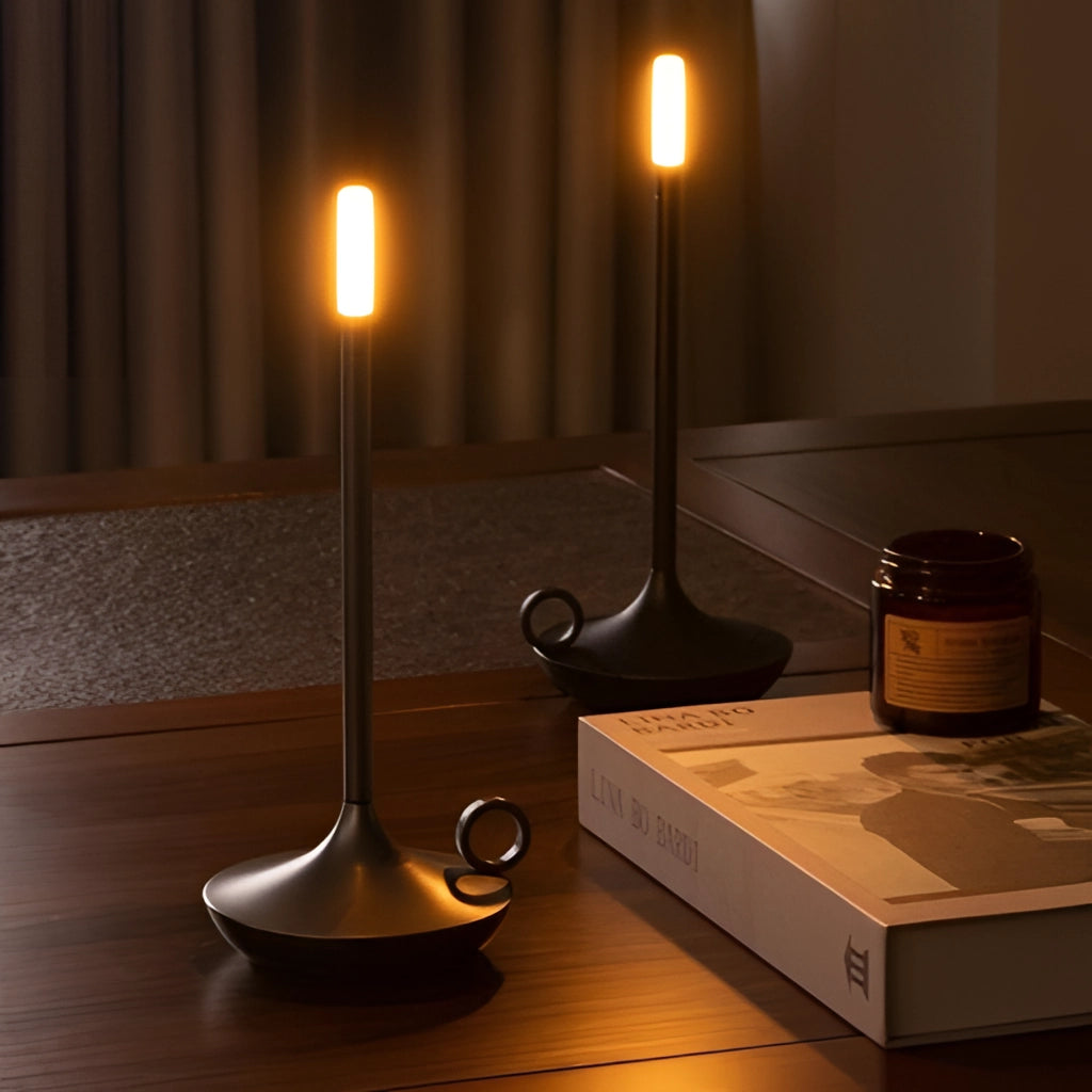 Nordic candlestick light with adjustable dimming feature, rechargeable aluminum casing, warm amber glow, and wooden base.