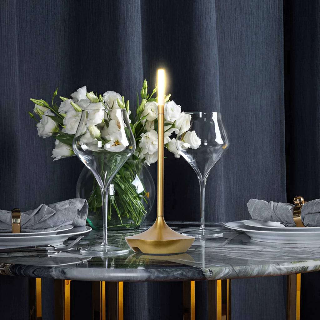 Nordic candlestick light with adjustable dimming on a table, surrounded by flowers and tableware.